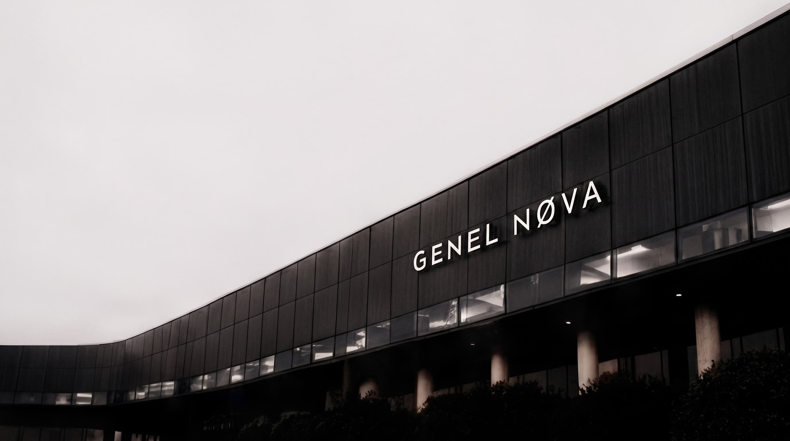 The Genel Nøva building at dusk, seen from below